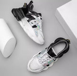 Queen “Zag” Trainer